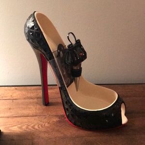 Wine holder and bottle stopper